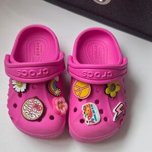 CROCS Kids Vibrant Pink Clogs with Fun Charms